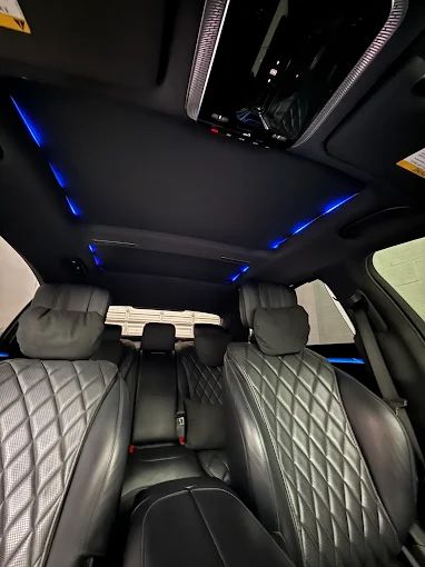 Starlight headliner installation in SUV interior